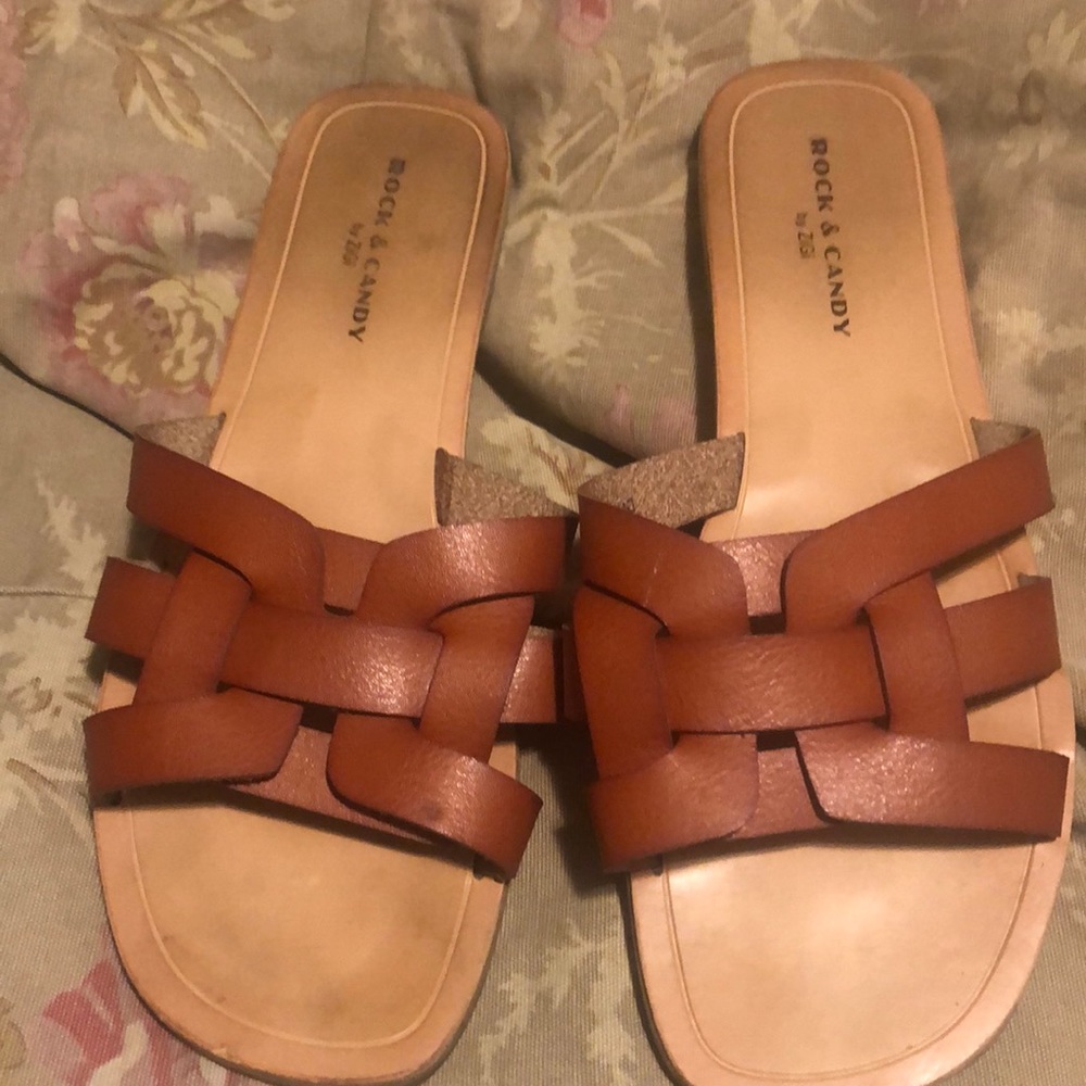 Gently use slip on sandals.